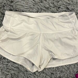Good condition white 2.5 inch speed ups.